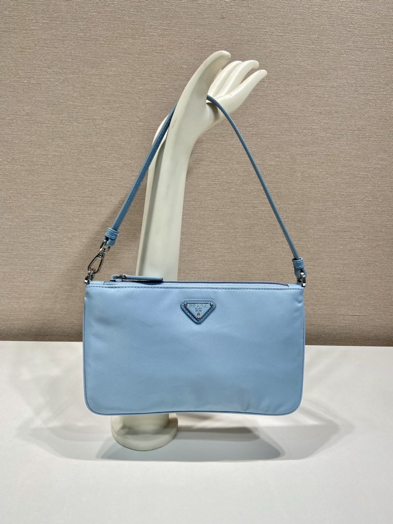Pra*a clutch bags